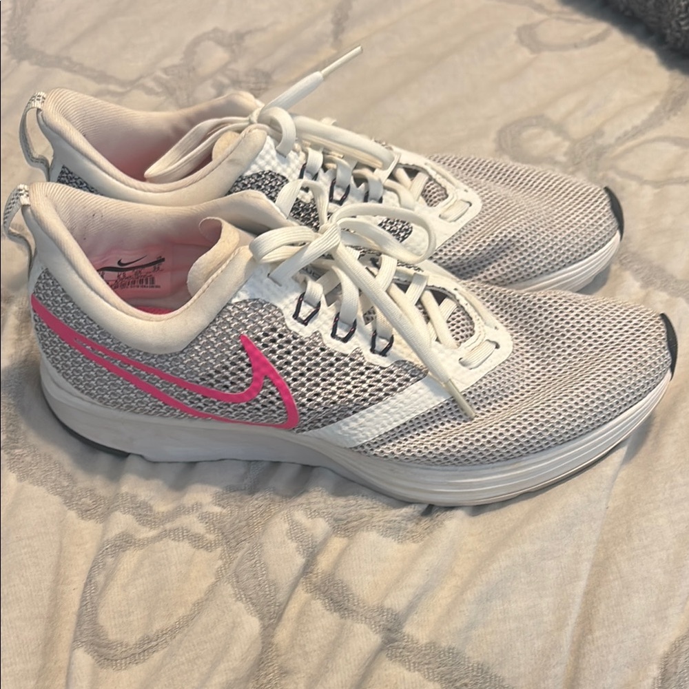 Nike White and Pink Sneakers with Sporty Design